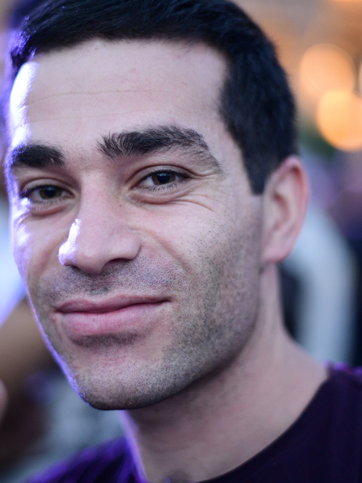 A young man smiles straight into the lens, Yerevan